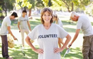 Volunteer Group Clearing Litter In Park